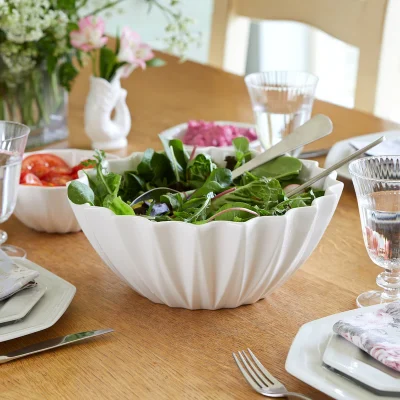 Gurgly Large Etoile Bowl in Cotton on dining table with summer salad