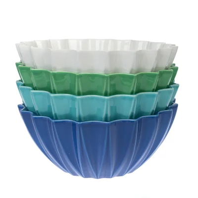 Collection of Gurgly Etoile fluted bowls on white background