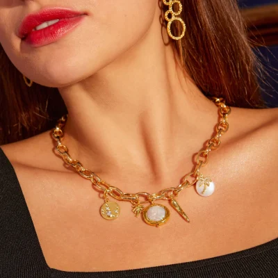 Palma Gold Charm on model with Elise necklace - Ashiana at Maison White