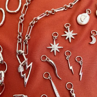 Lightning bolt charm with charm assortment