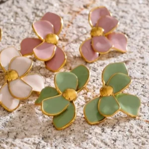Misgraceful Enamel Flower Earrings - Pink, green and beige on stone background