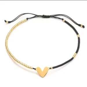 Misgraceful Heart Charm Seed Bead Friendship Bracelet at Maison White in detail